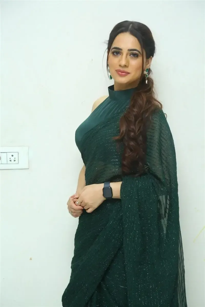 TOLLYWOOD ACTRESS PRIYANKA REWRI IN GREEN SAREE AT PREMA DESHAPU YUVARANI MOVIE 2